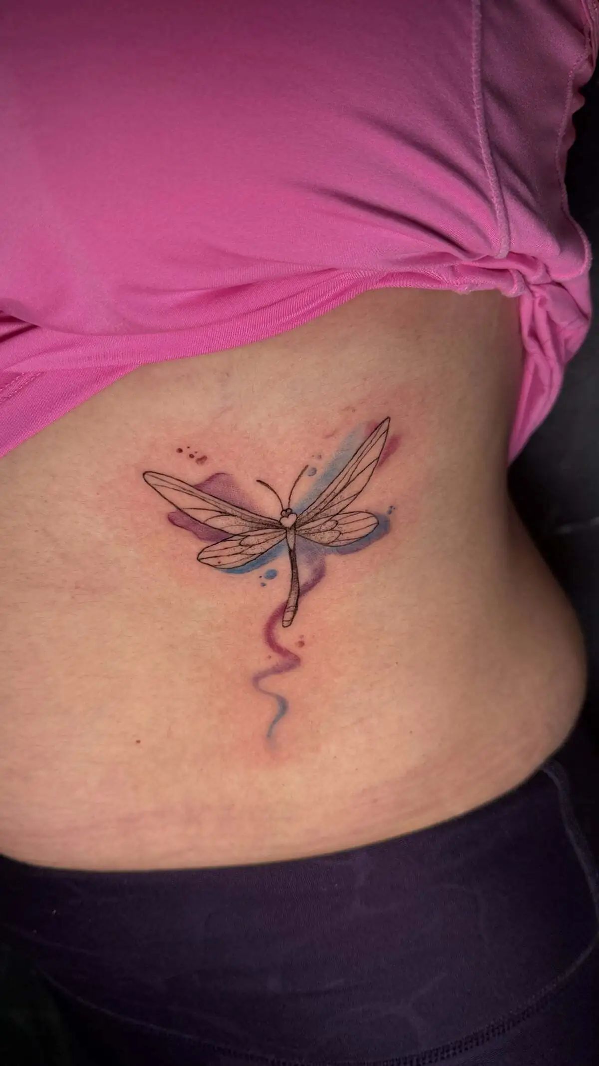 dragonfly fine line watercolor hip tattoo