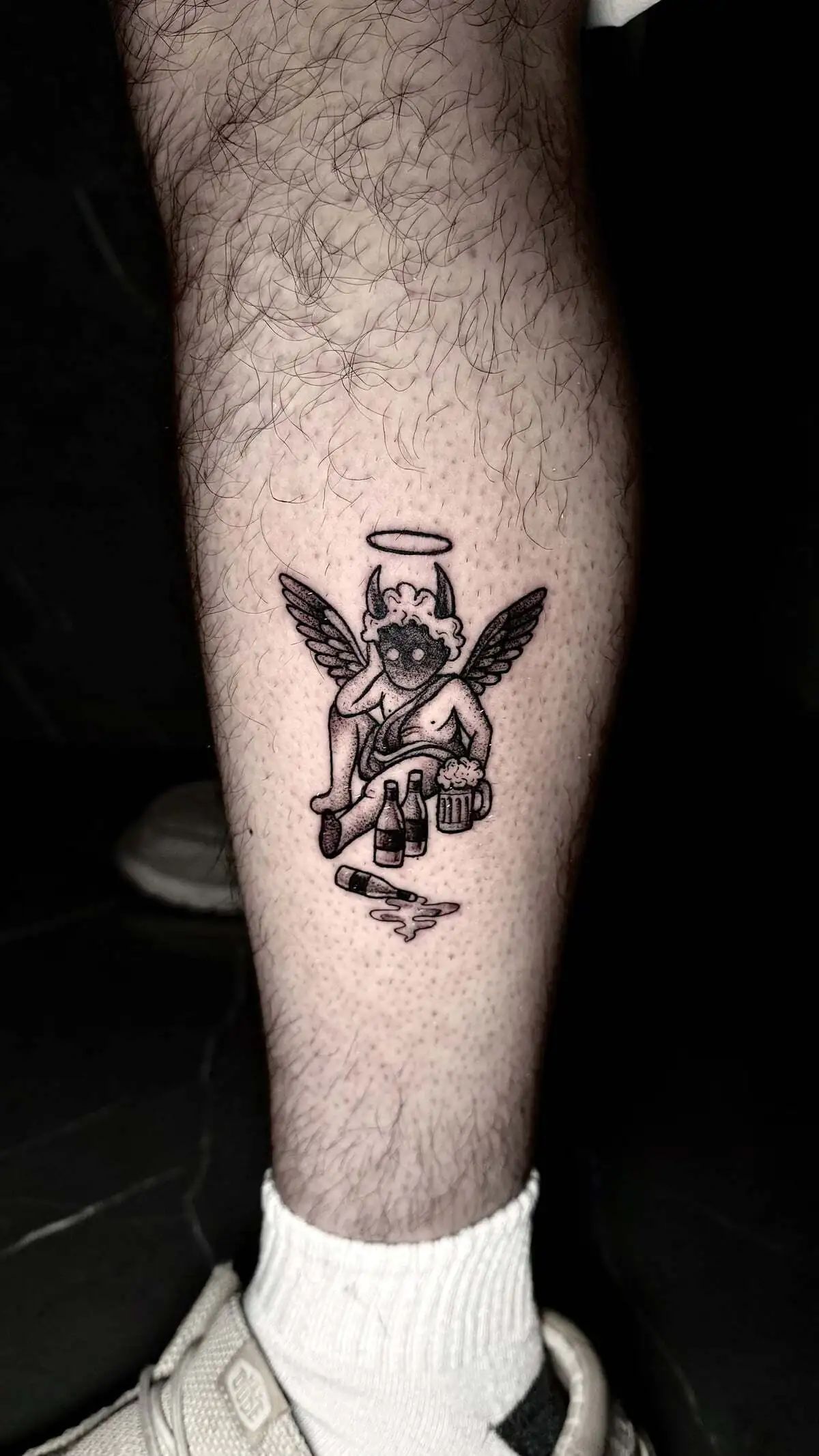 fallen angel cherub beer calf tattoo