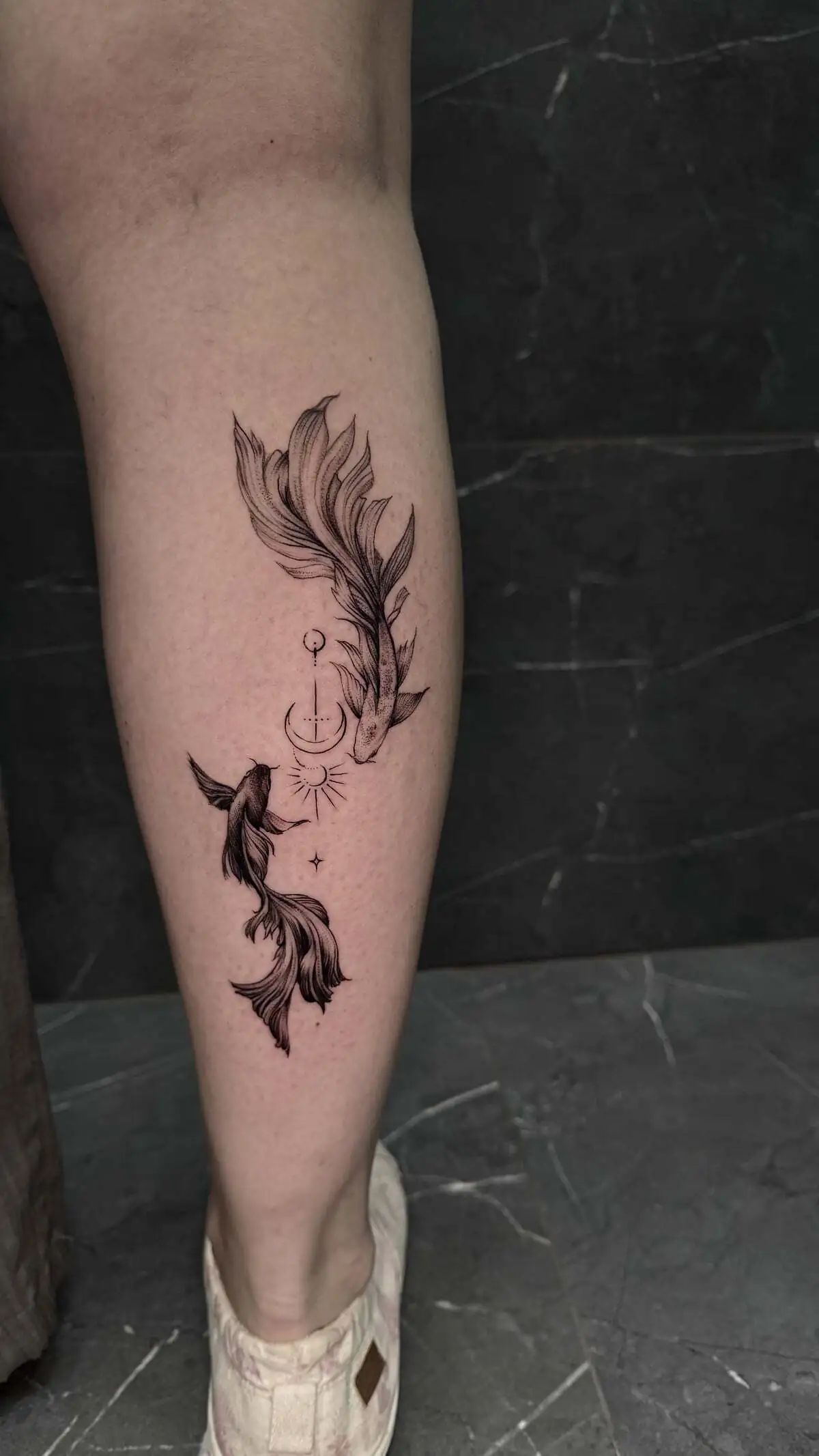 yin yang koi fish micro realism calf tattoo