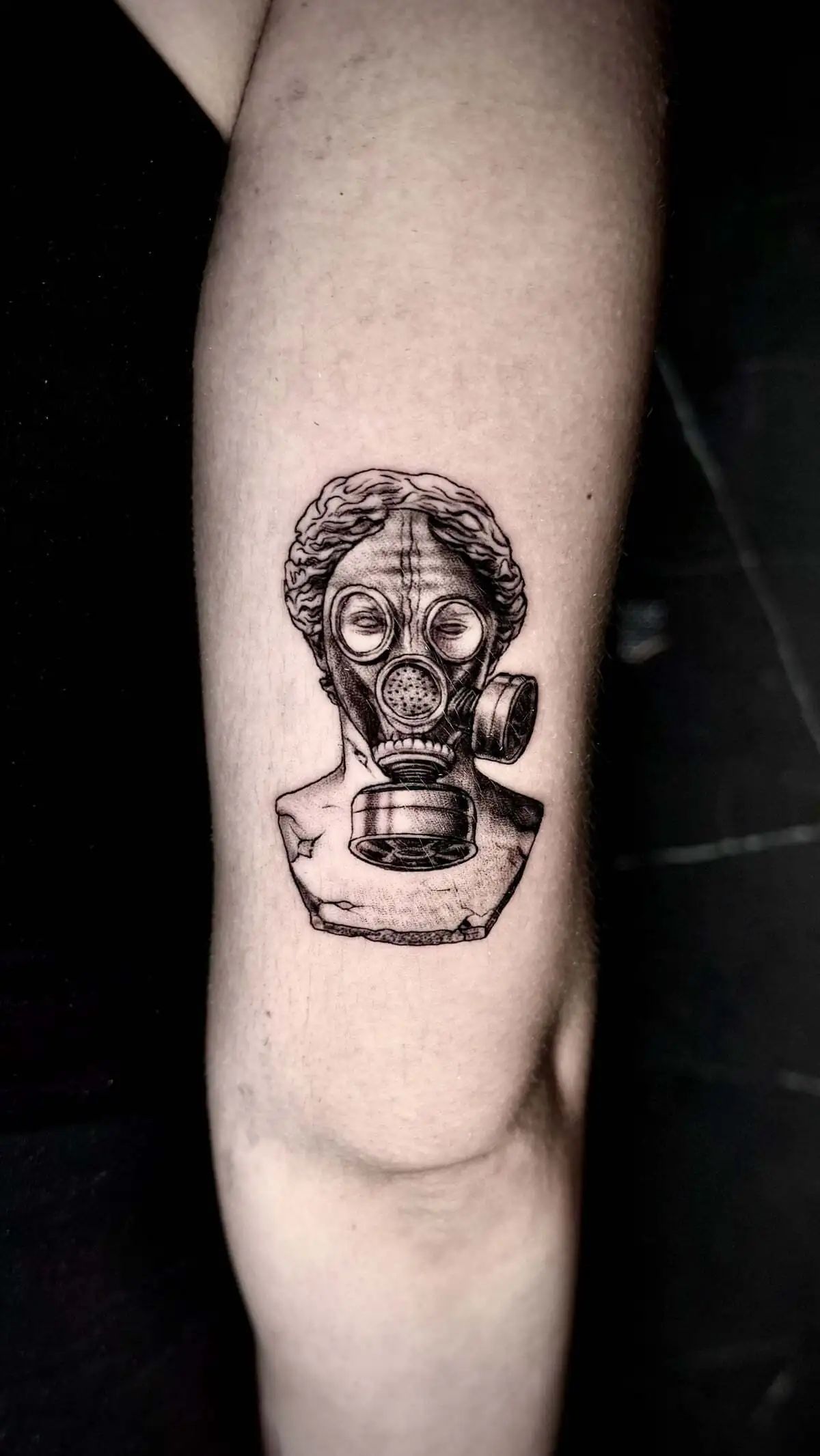 classical statue bust gas mask micro realism forearm tattoo