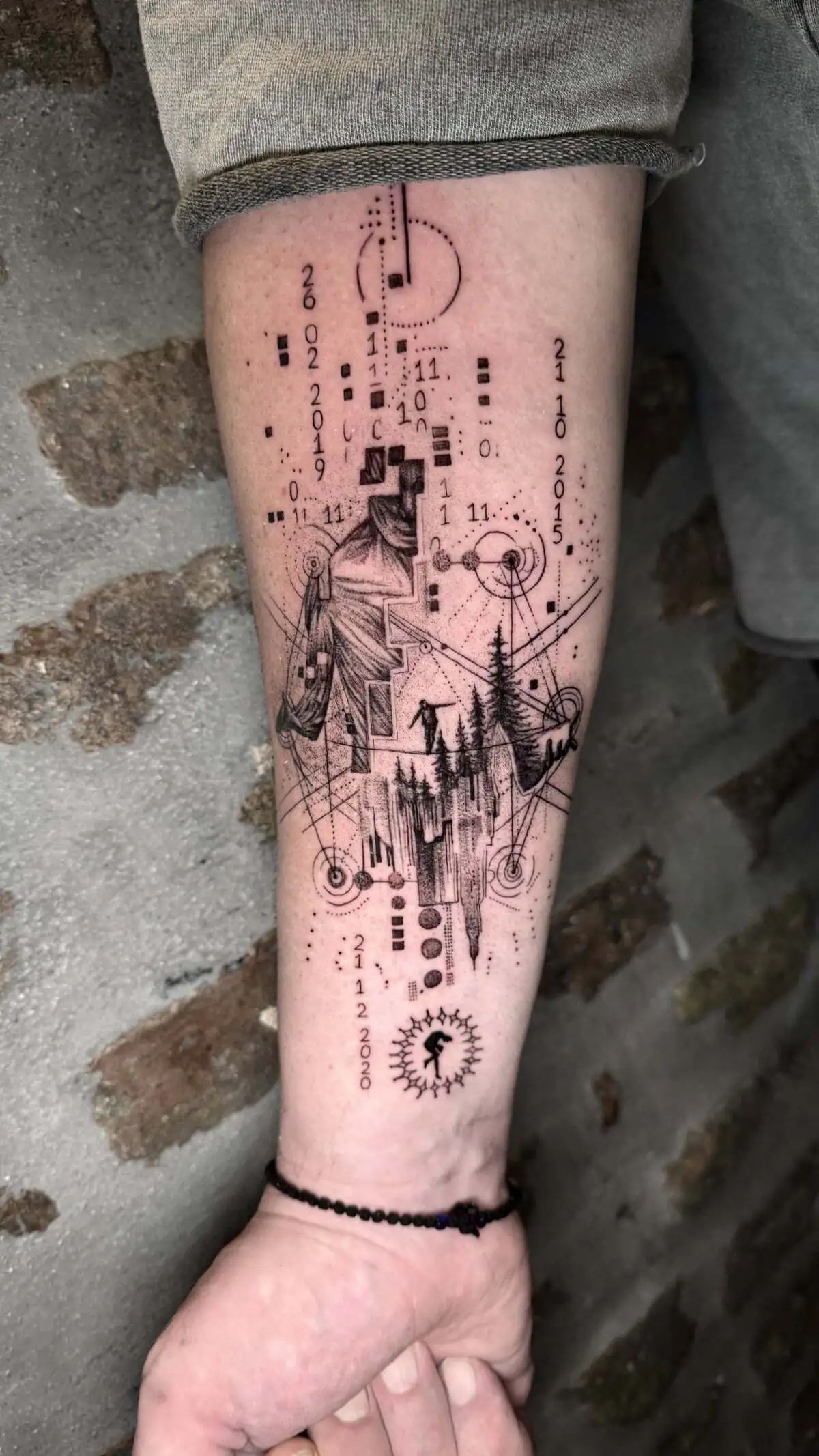 abstract geometric landscape micro realism forearm tattoo